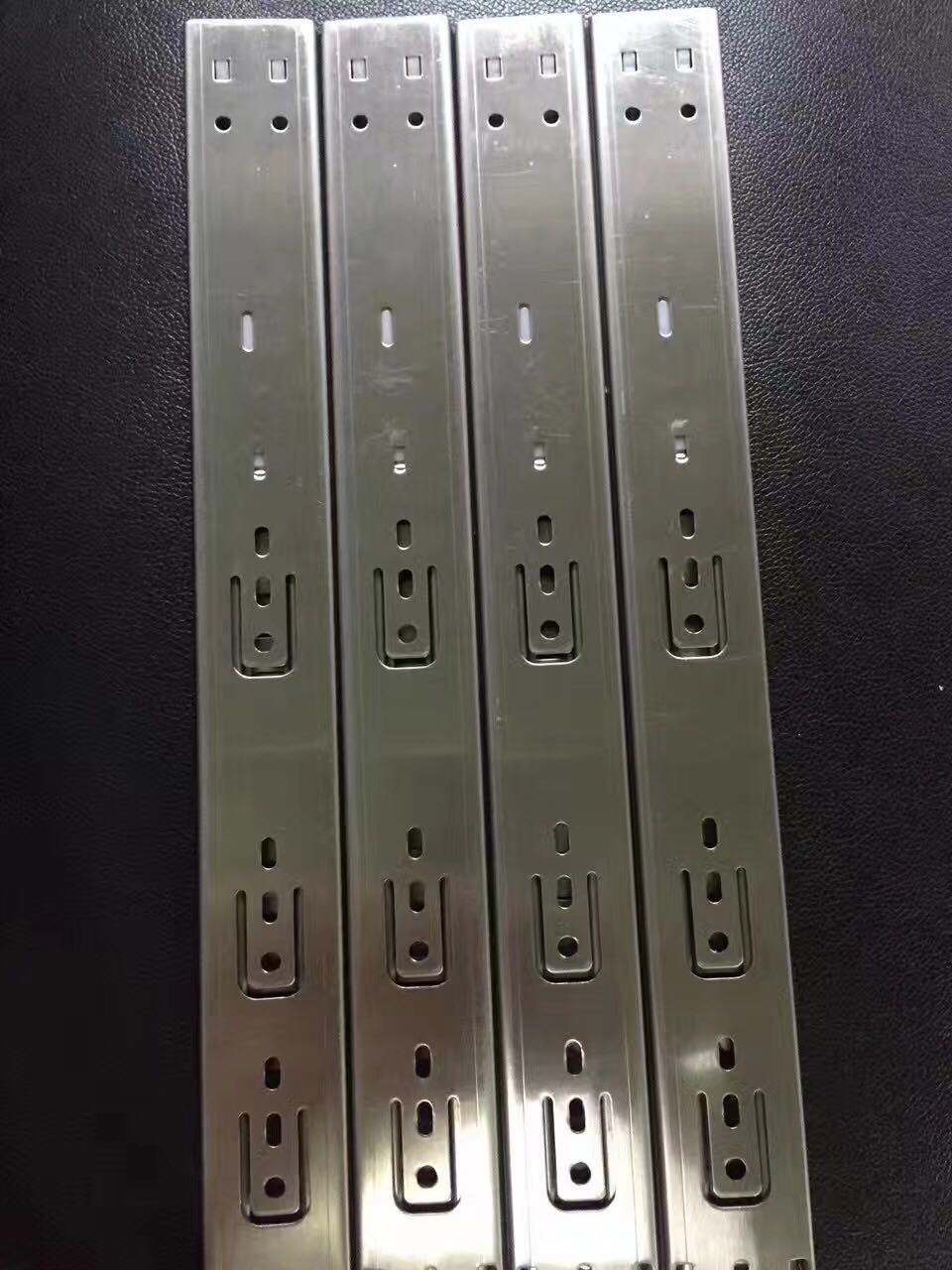 伸缩槽抽屉滑卷成型机